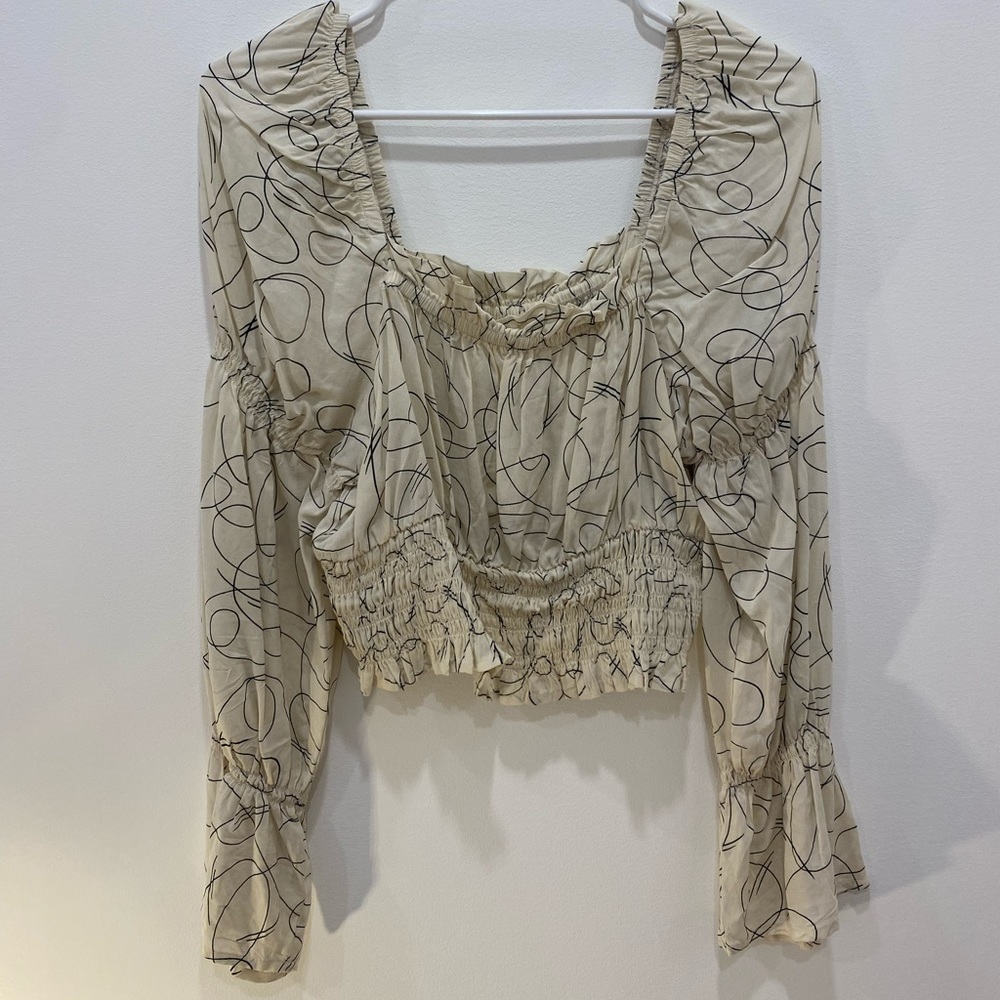 Cropped long sleeve blouse